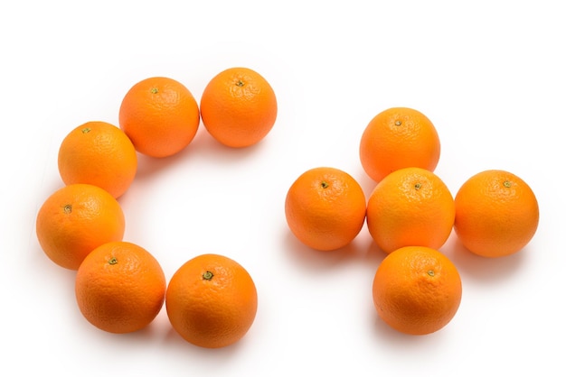 Oranges isolated on white background Vitamin C symbol