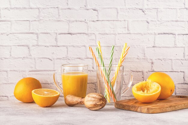 Oranges and juicer for making orange juice