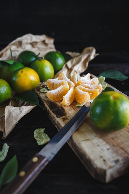 oranges and knife on table