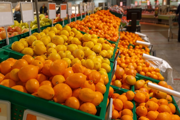 Oranges and lemons on the counter in the store