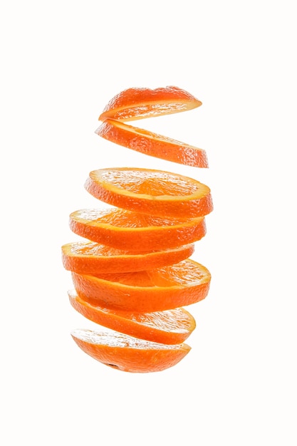 Oranges peeled in spiral shape isolated