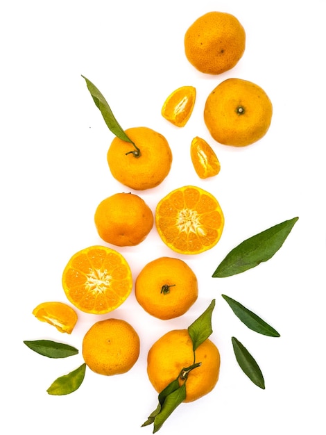 Oranges with green leaves on a white background