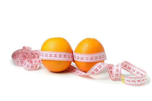 Oranges with measuring tape isolated