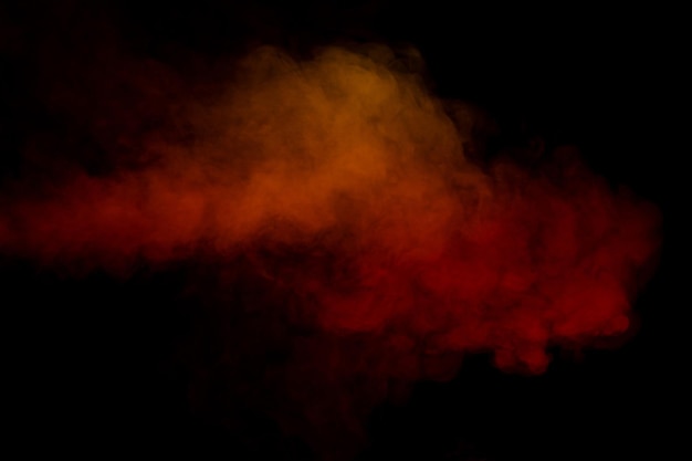 Oranje en rode stoom op een zwarte achtergrond