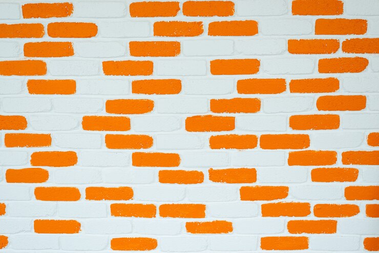Foto oranje en witte bakstenen muur