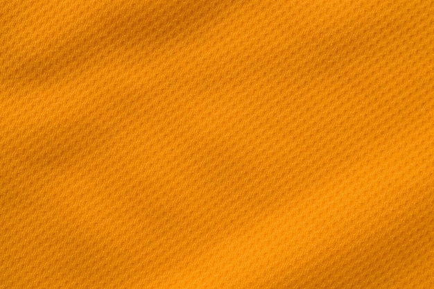 Oranje kleur sportkleding stof jersey voetbalshirt textuur bovenaanzicht