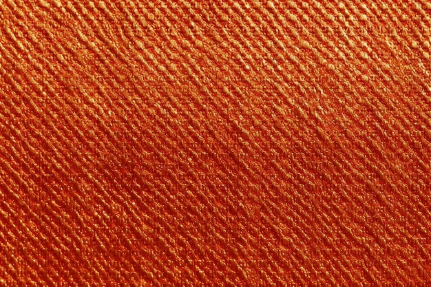 Oranje kleur stof textuur voor achtergrond Abstracte achtergrond en textuur voor ontwerp