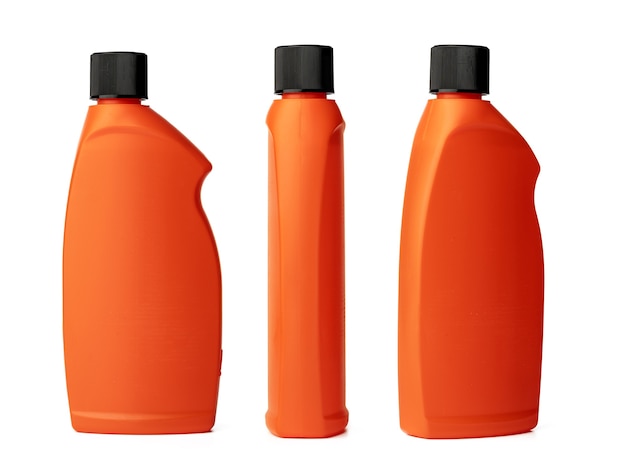 Oranje plastic fles vloeibaar wasmiddel geïsoleerd op wit