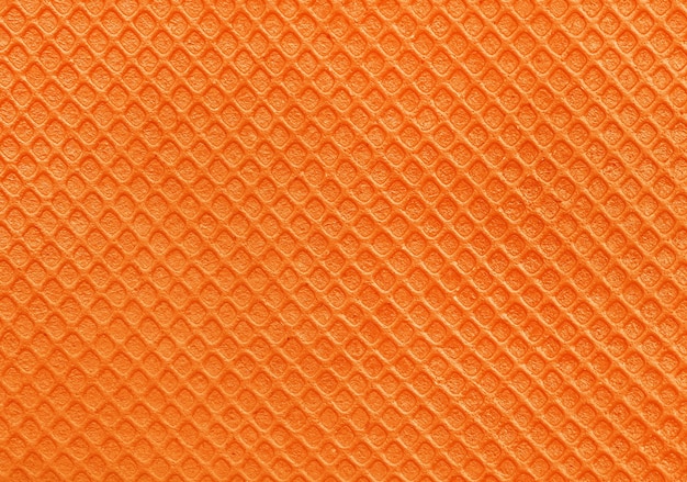 Oranje rubber textuur achtergrond met naadloze patroon.