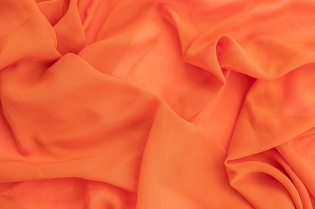 Oranje sjaal textuur achtergrond, minimaal concept idee.