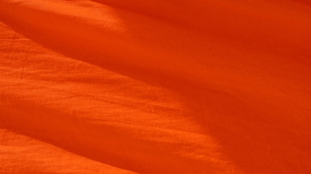 Oranje stoffentextuur - achtergrond