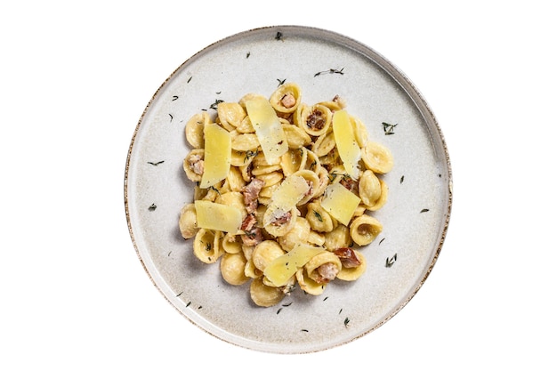 Orecchiette homemade carbonara pasta with pancetta egg hard parmesan cheese and cream sauce Isolated on white background