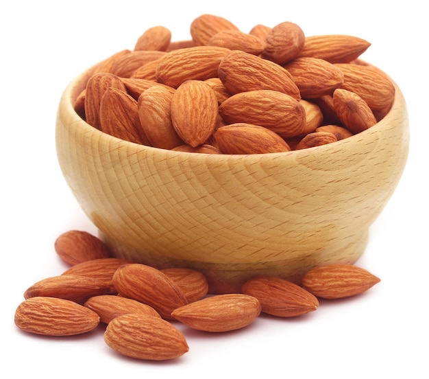 Organic almonds fresh uncooked over white