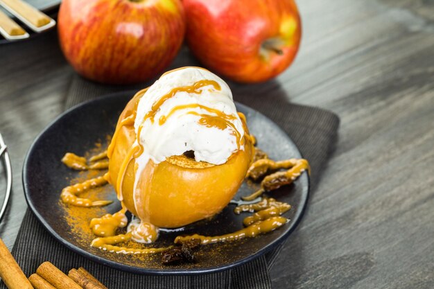 Organic baked apples served with vanilla ice cream.