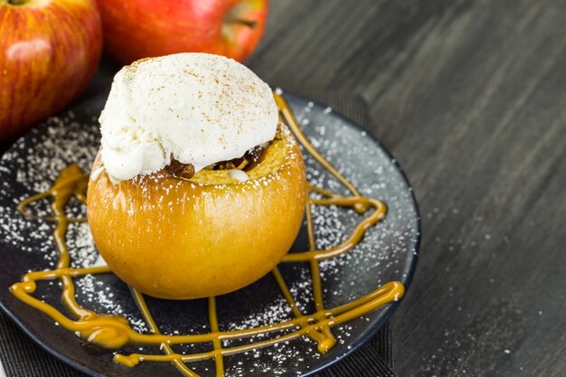 Organic baked apples served with vanilla ice cream.