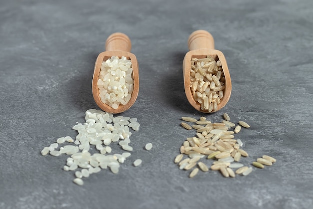 organic brown raw rice wooden scoops