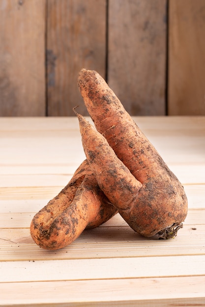 organic carrot from home garden on wood table