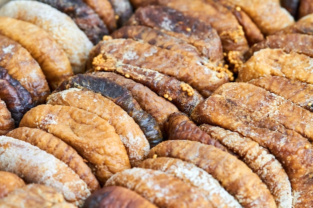 Organic dried figs closeup as vegetarian food background
