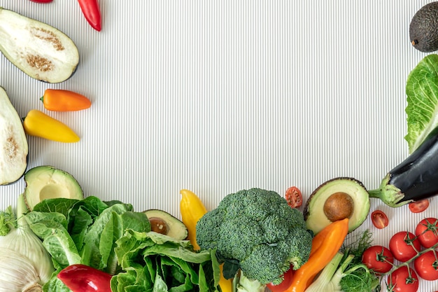 Organic fresh vegetables on white background flat lay