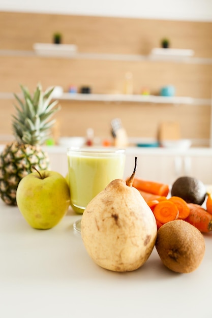 Organic fruits and vegetables on the table at the kitchen. Raw nutrition