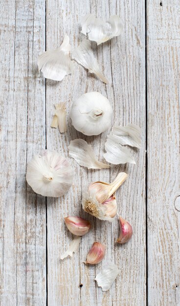 Organic garlic on the old wooden table top view