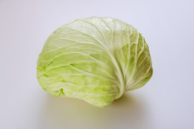 Organic green cabbage isolated. Close up.