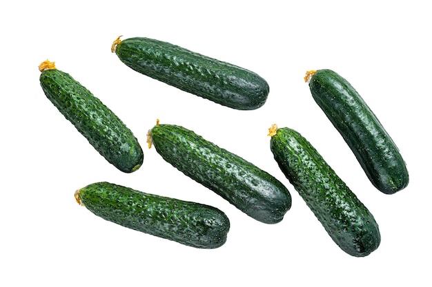 Organic Green Cucumbers on a kitchen table Isolated on white background