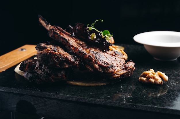 Organic Grilled Lamb Chops on stone board