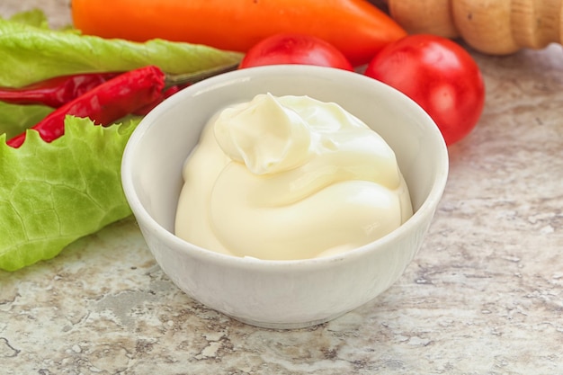 Organic homemade mayonnaise sauce in the bowl