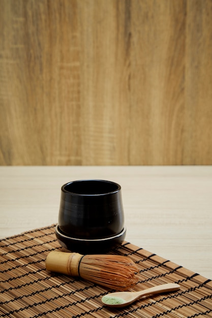 Organic matcha green tea on wooden