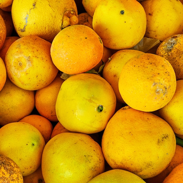 Organic orange fruits at the market close-up