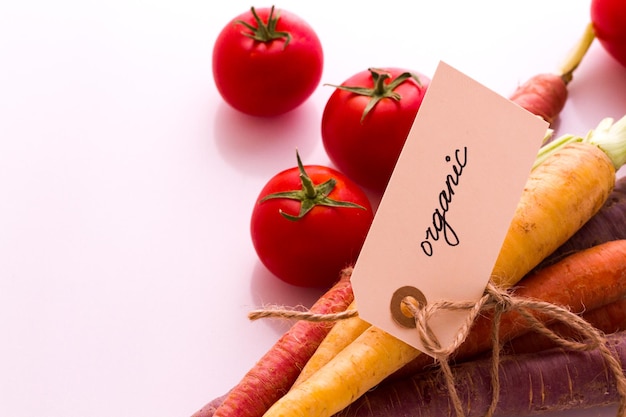 Organic rainbow carrots and tomatoes from the local farm.