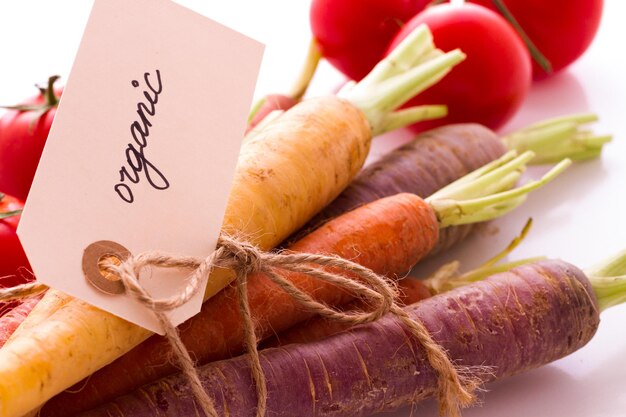 Organic rainbow carrots and tomatoes from the local farm.