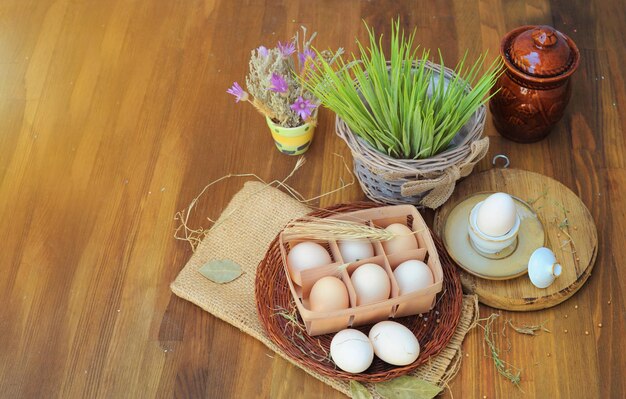 Organic raw chicken eggs in natural egg box