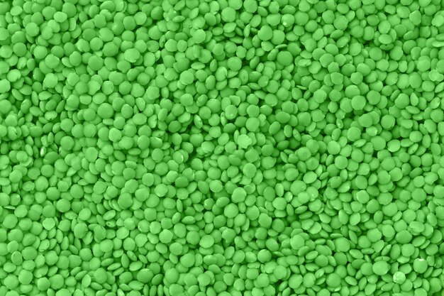 Organic raw green lentil background top view