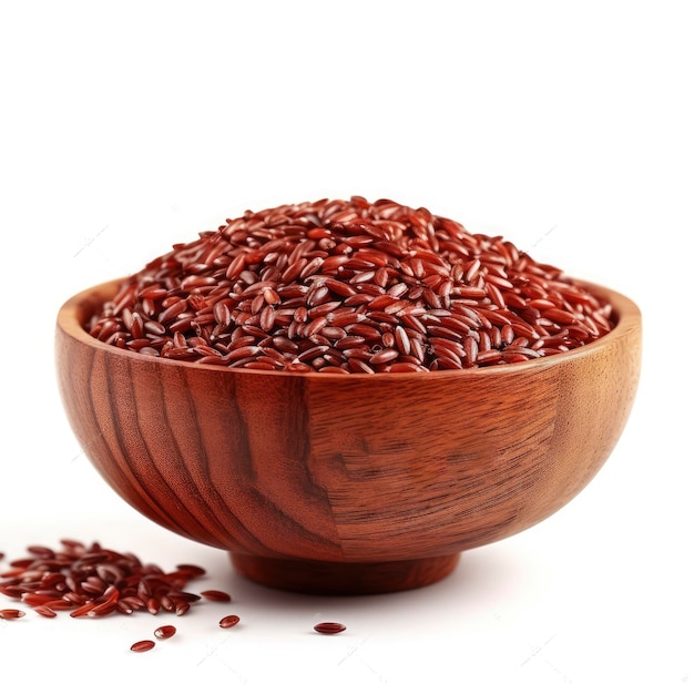 Organic raw red rice in a wooden bowl on white background