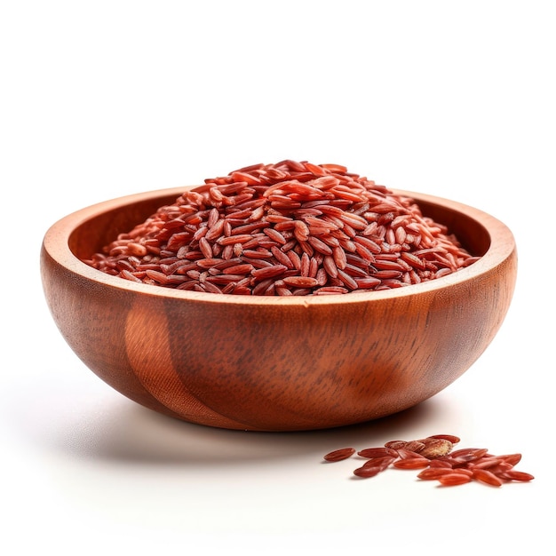 Organic raw red rice in a wooden bowl on white background