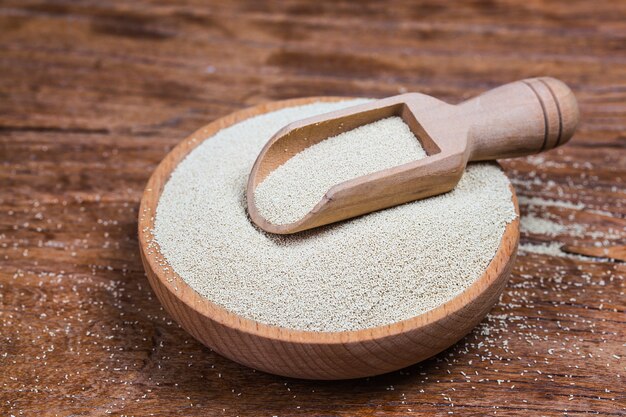 Organic Raw Yeast for baking bread against a background