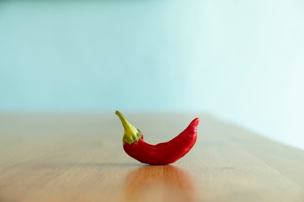 Organic red bell pepper with outoffocus background and copy spacepepper