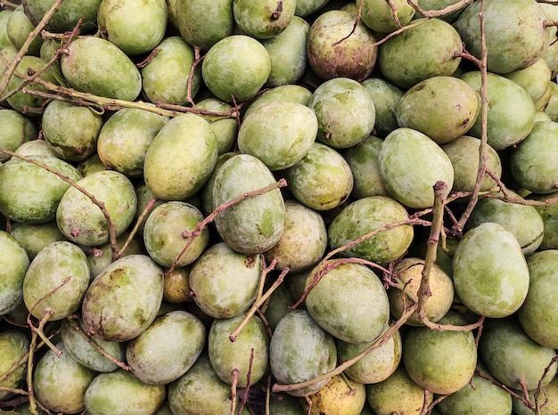 Organic Ripe Mango sale in market close up photo delicious healthy sweet and green mango