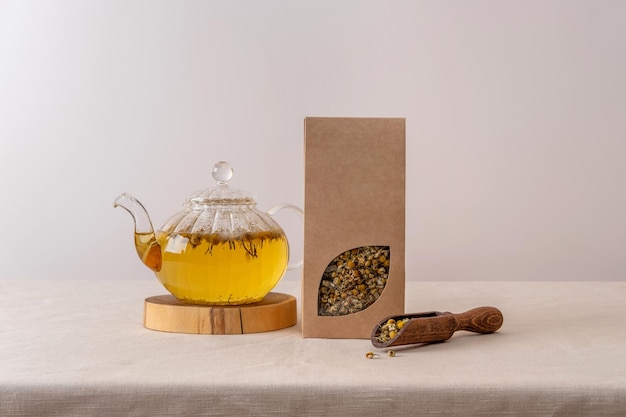 Organic tea branding and packaging mockup Blank tea packaging mockup with tea Kraft paper pack with window and empty space to display your branding design