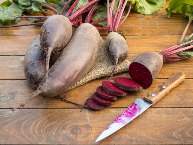 Organic vegetable beetroot on a wooden background closeup Vegetarian food