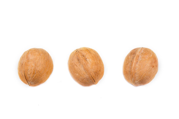 Organic walnuts isolated on white background