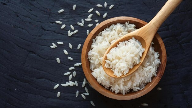 Organic white rice in wooden spoon glutinous rice or sticky ric