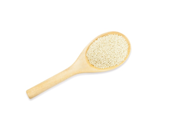 Organic White Sesame seed on wooden spoons isolated on white backgroundtop view