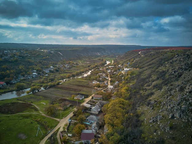 Orheiul Vechi hills and river scenery in Moldova . Valley of river Raut in villages Butuceni and Trebujeni from Moldova . Famous touristic place . Church on the top on the hill