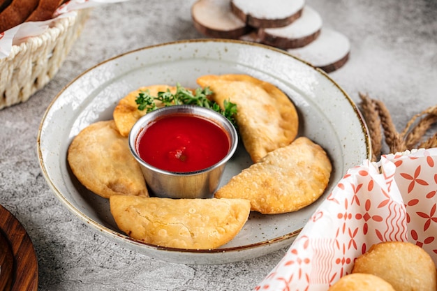 Oriental fried patties chebureks with meat filling