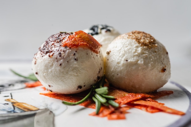 Photo oriental homemade cheese macro with rosemary, nigella, kalindzhi, sumy, garam masala