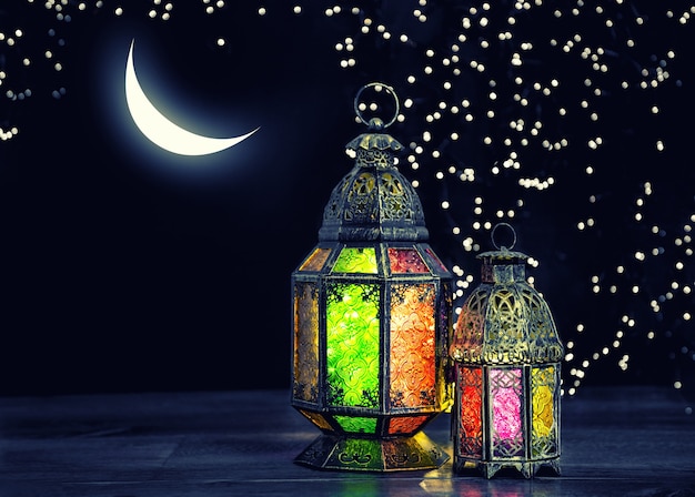 Oriental light lantern with moon and stars. Ramadan kareem. Vintage style toned picture