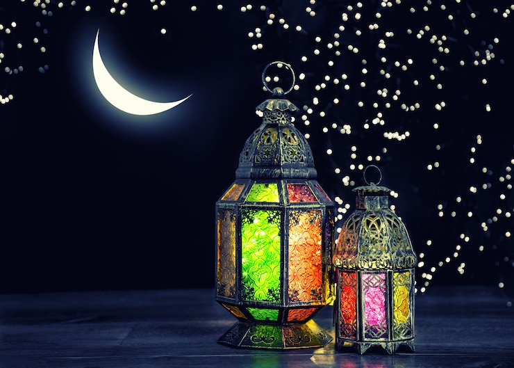 Photo oriental light lantern with moon and stars. ramadan kareem. vintage style toned picture
